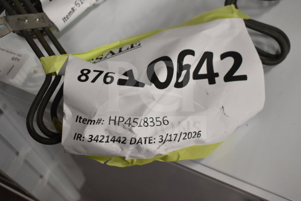 4 new scratch-and-dent heating elements, including Hatco, Garland 10kW, and Pitco 11kW, wrapped with info tag.