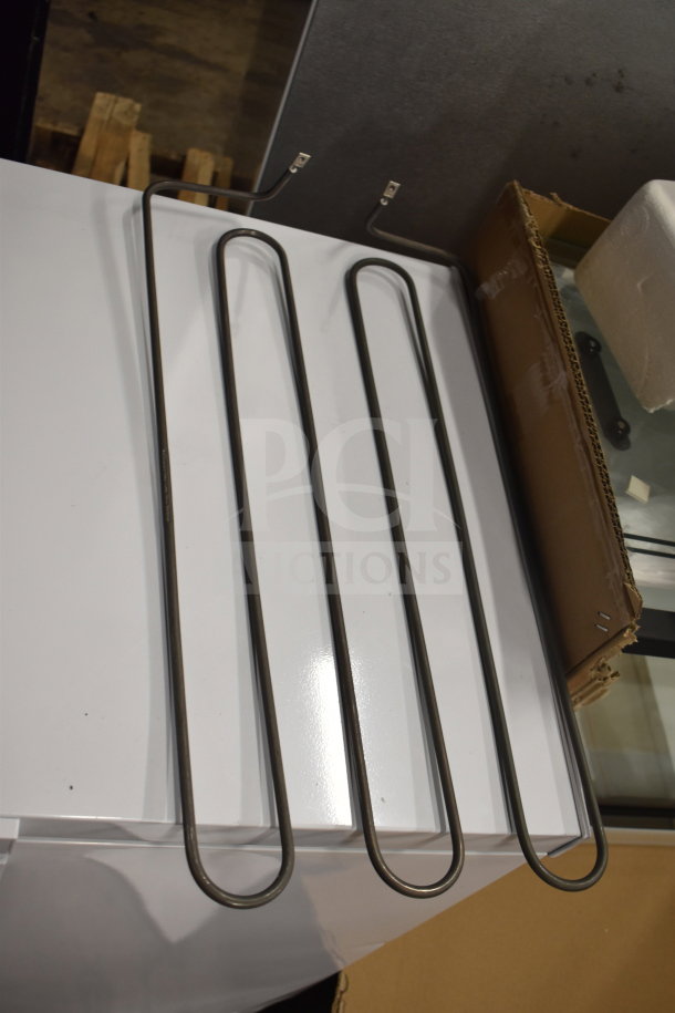 Brand new Hatco X02.08.675.00 880W 240V top element, showing metal heating coil with terminals in a box.