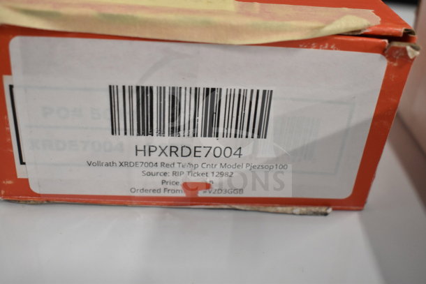 Box of new Vollrath XRDE7004 Red Temp Center, model Pjezsop100, with visible label and barcode.