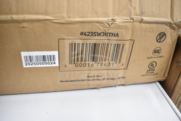 Cardboard box showing barcode and model number #423SW36THA for a ServIt 36" Strip Warmer. Box has minor dents.