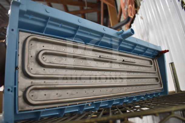 Brand new Avantco Ice 1946239A evaporator for EUC-H-340-A, visible scratch and dent, blue housing, metal coils.
