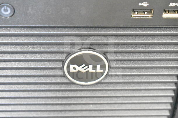 Dell PowerEdge T130 computer tower, black, with Dell logo, USB ports, and power button visible.