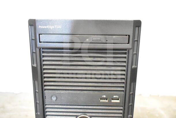 Dell PowerEdge T130 computer tower, front view, with USB ports, power button, and CD drive. Item in good condition.