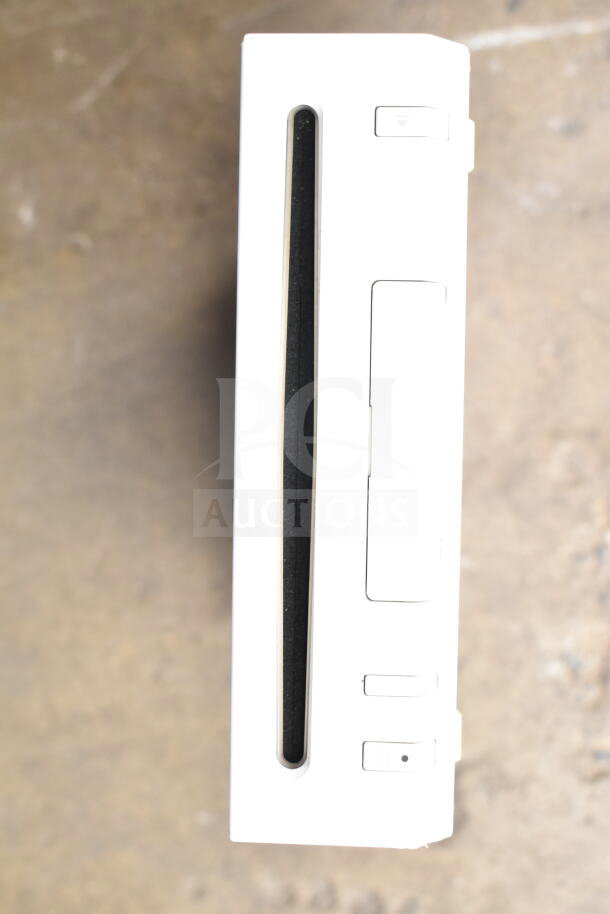 Nintendo Wii console in white, horizontal orientation, optical disc slot visible, minimal wear.