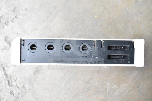 Nintendo Wii console bottom view showing controller ports and memory card slots. Used condition.