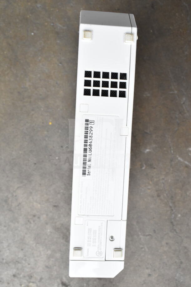Nintendo Wii console, white, showing label with serial number LU06438299, auction set includes controllers, WiiFit Plus, WiiSports.