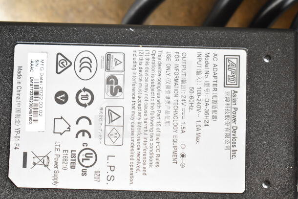 AC adapter label from Asian Power Devices Inc, model DA-36H24. Inputs 100-240V, outputs 24V, 1.5A. MFG Date: 2022-03-02.