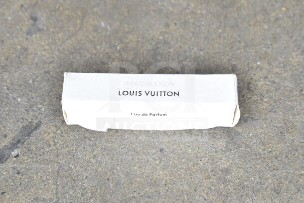 A white rectangular Louis Vuitton perfume box labeled "Imagination" and "Eau de Parfum."