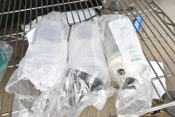 8 packaged items including Hatco R02.19.017.00 switch and Salter Labs hoses on metal shelf.