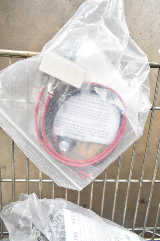 Eight various items including Hatco R02.19.017.00 Infinite Switch and Salter Labs hoses, in sealed plastic bag.