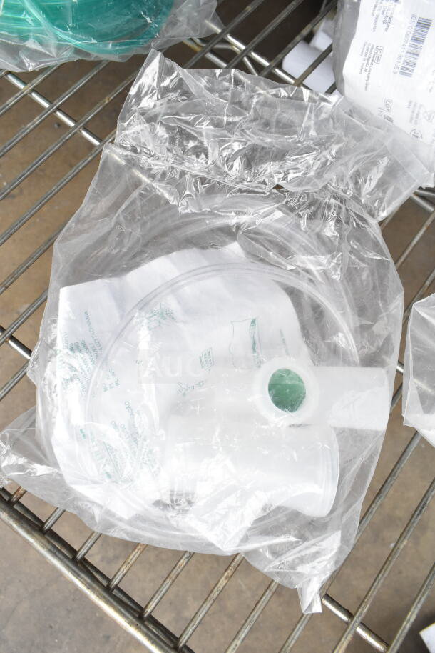 Clear plastic-wrapped medical hoses, possibly Salter Labs. Items include Hatco R02.19.017.00 Infinite Switch.