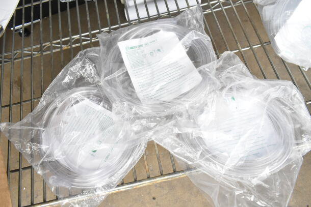 8 plastic-wrapped Salter Labs hoses on metal shelf, each with instruction sheet. Auction lot includes Hatco R02.19.017.00 switch.