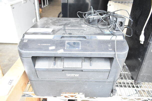 Brother HL-L2380DW printer, scanner, copier machine on countertop. Visible dust, cables included, 120 volts, 1 phase.
