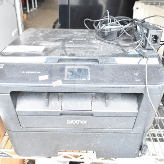 Brother HL-L2380DW printer, scanner, copier machine on countertop. Visible dust, cables included, 120 volts, 1 phase.