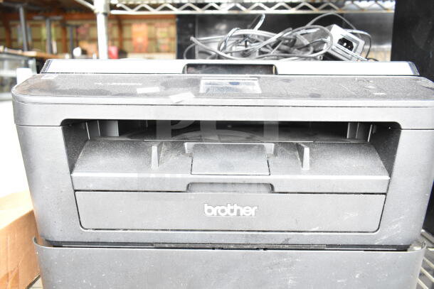 Brother HL-L2380DW printer scanner copier, countertop model. 120 volts, 1 phase. Visible dust, good condition.