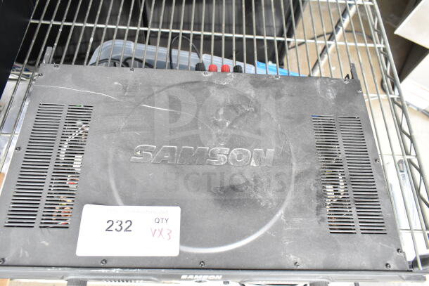 Samson Servo 120a amplifier on metal rack, visible dust and wear. Auction tag labeled "232, QTY VX3."