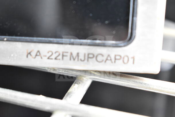 Close-up of POS monitor with etched code KA-22FMJPCAP01, part of a lot including Epson and Dell receipt printers.