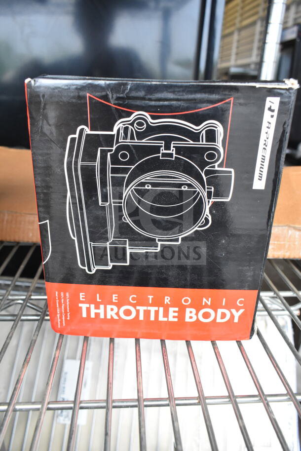 2 Items: THBB1112-C throttle body in original box and Regency 600BDP30 beer drip tray, offering value for auction.