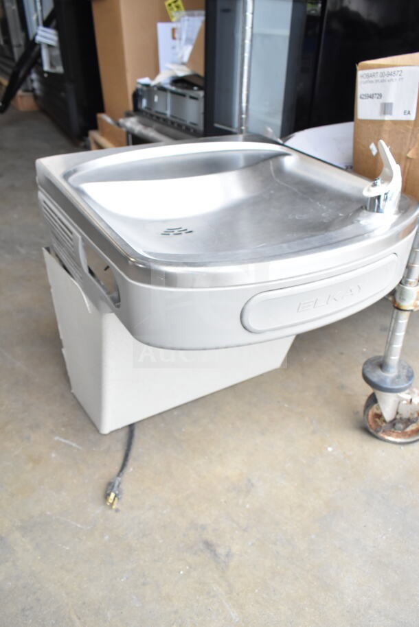 Elkay EZFSTL8 wall mount water fountain, features stainless steel basin, Elkay branding, excellent condition.