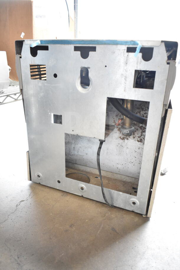 Elkay EZFSTL8 wall mount water fountain, back view, showing internal components and wiring. Visible wear and minor rust.