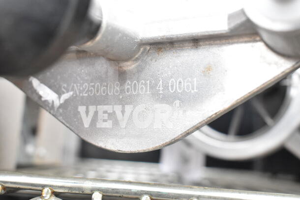 Vevor Countertop Vegetable Wedge Cutter, stainless steel, close-up of serial number 250608 6061 4 0061, in good condition.