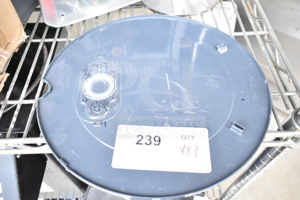 3 various items, including a Roomba base in used condition; auction label reads "239 QTY XX3."