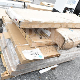 8 new scratch and dent items, including a Regency shelf and work table. Tags show lot JUN26-51, PCI label visible.
