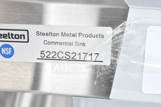 Brand new Steelton 522CS21717 two-compartment sink. No legs. Features 17"x17"x12" bowls. Scratch and dent condition.
