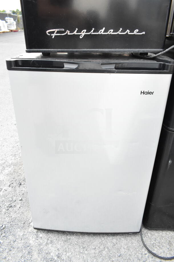 Four mini coolers including Frigidaire, Haier, Hisense, shown together. Each operates at 120 volts, 1 phase.