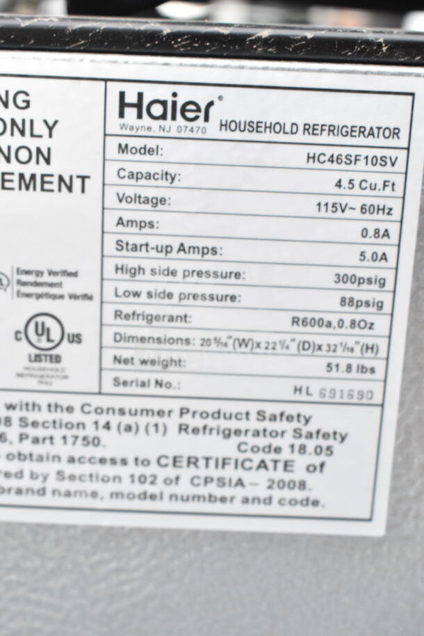 4 various mini coolers including Frigidaire, Haier, Hisense. Haier model HC46SF10SV, 4.5 cu. ft., 115V, 51.8 lbs.