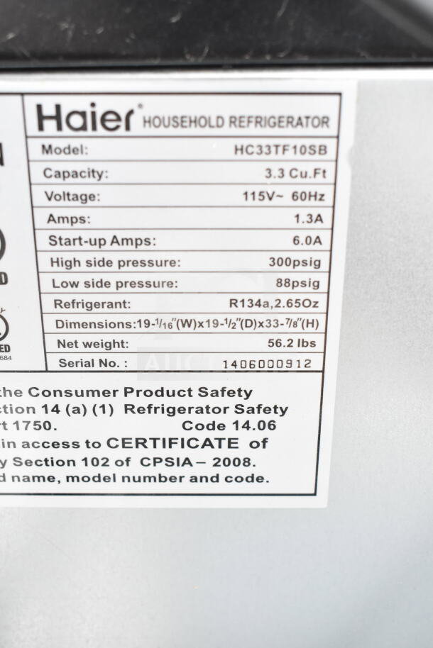 Label on Haier mini cooler, model HC33TF10SB. Capacity 3.3 cu. ft., voltage 115V, 1.3A. Serial No. 1406000912.