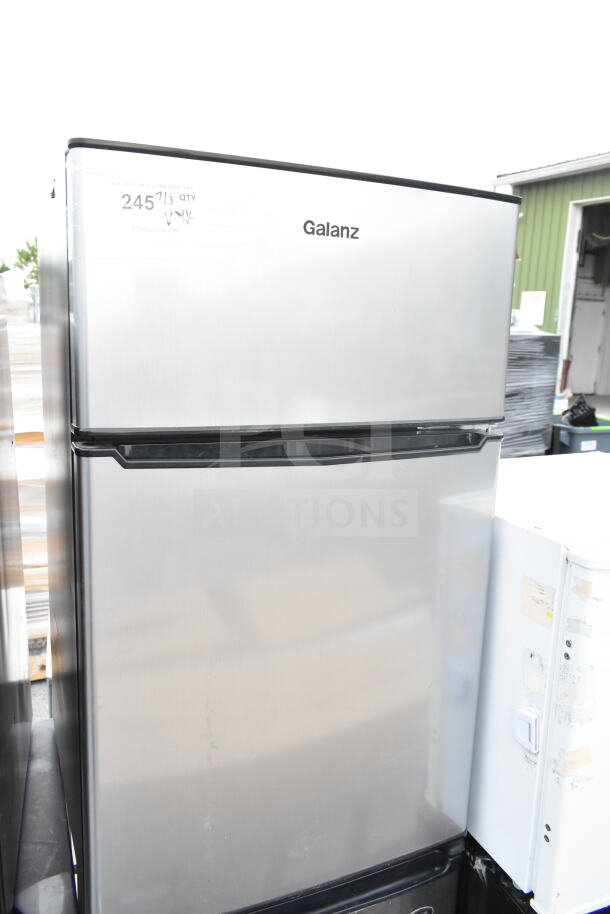 Four mini coolers including Galanz, Sanyo, and EdgeStar models. Stainless steel finish, 120 volts, 1 phase. Auction lot includes four units.