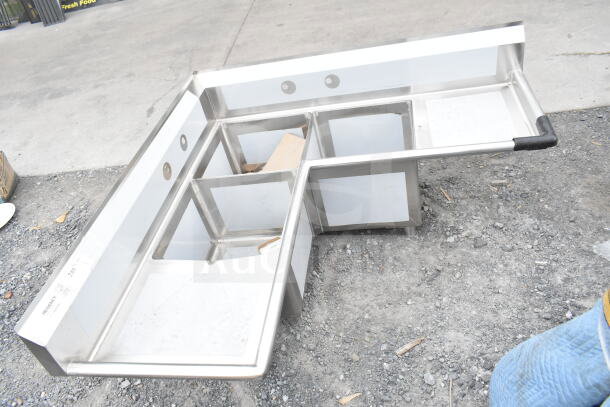 BRAND NEW SCRATCH AND DENT Regency 600S3181818C 57" three-compartment commercial corner sink with two 18" drainboards.