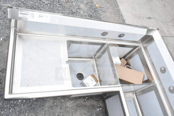 BRAND NEW Regency 600S3181818C 57" commercial corner sink, three compartments, two 18" drainboards, scratch and dent condition.