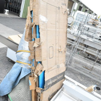 KoolMore KM-SWD30 commercial door, 30x84 inches, in damaged packaging. Aluminum with 9x14 inch window, new condition.