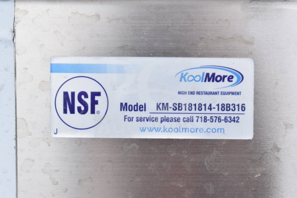 Brand new KoolMore KM-SB181814-18B316 commercial sink, 72", 16-gauge, with backsplash, dual 18" drainboards. NSF label visible.