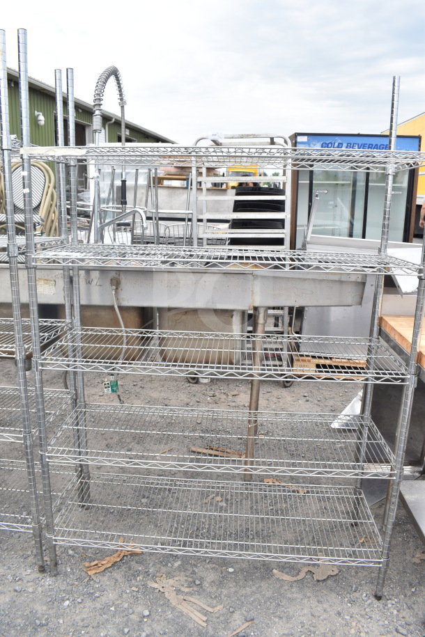 Chrome finish 5-tier wire shelving unit, sturdy and in good condition. Buyer must dismantle for shipping. Consider freight charges.