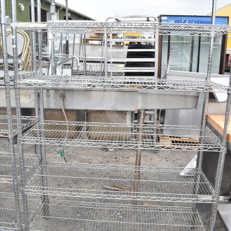 Chrome finish 5-tier wire shelving unit, sturdy and in good condition. Buyer must dismantle for shipping. Consider freight charges.