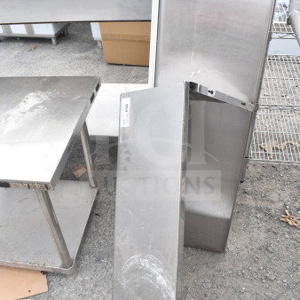 Two metal wall mount shelves, used condition, showing signs of wear, with visible label "260" on one shelf.