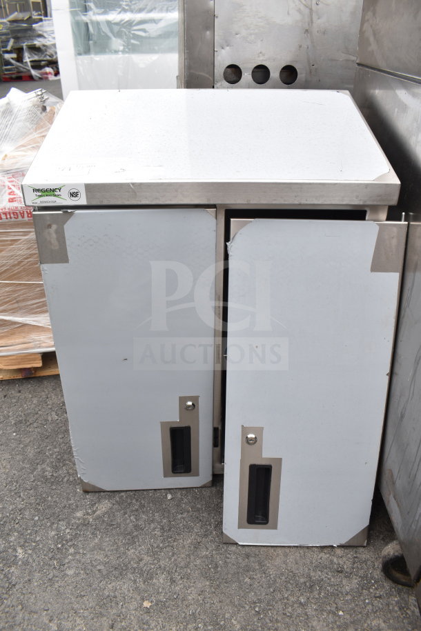 BRAND NEW Regency 24" stainless steel wall cabinet, model CW-1524STHD-318, with hinged doors, scratch and dent condition.