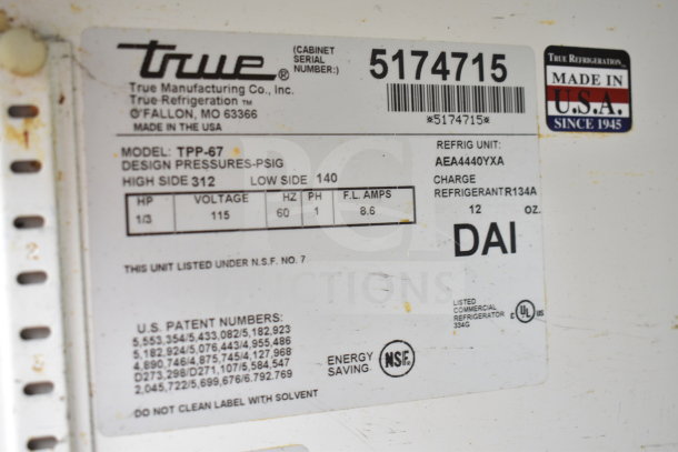 True TPP-67 commercial pizza prep table label, 115 volts, 1 phase, model information. No lids included. Made in USA.