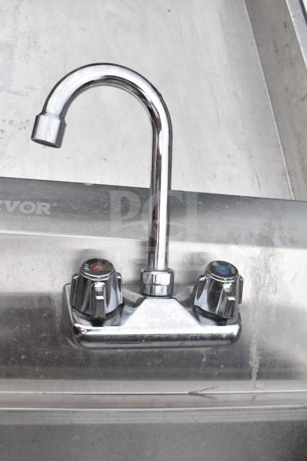 Vevor Single Bay Wall Mount Sink with dual temperature controls and polished faucet, in good condition. Marked "Vevor."