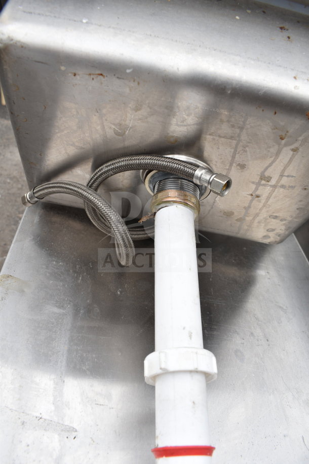 Vevor Single Bay Wall Mount Sink underside, showing plumbing connections and stainless steel finish, in good condition.
