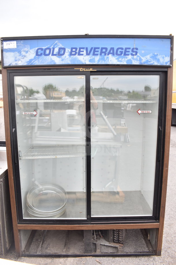 True GDM-47 commercial 2-door cooler, 115V, glass doors, "Cold Beverages" sign, good condition, exterior labels visible.