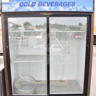 True GDM-47 commercial 2-door cooler, 115V, glass doors, "Cold Beverages" sign, good condition, exterior labels visible.