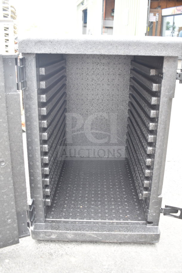 Cambro black top-loading EPP insulated food pan carrier, new with minor scratches and dents, open door view.