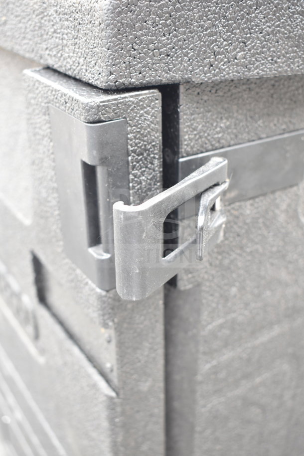 "New Cambro black EPP insulated food pan carrier, top loading, scratch and dent condition, secure latch detail."