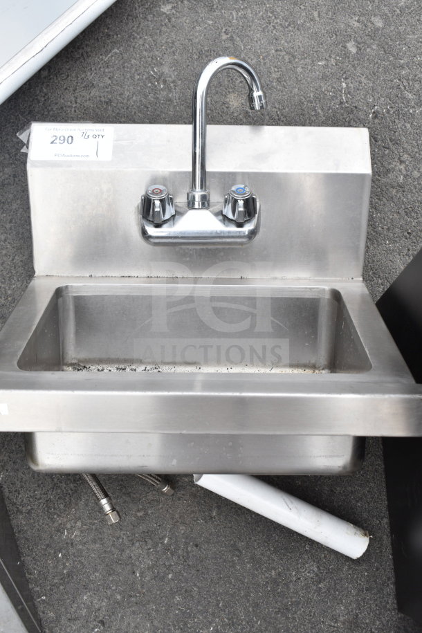 Commercial single bay wall mount sink with chrome faucet and dual handles. Stainless steel, good condition. Model 290 tag visible.