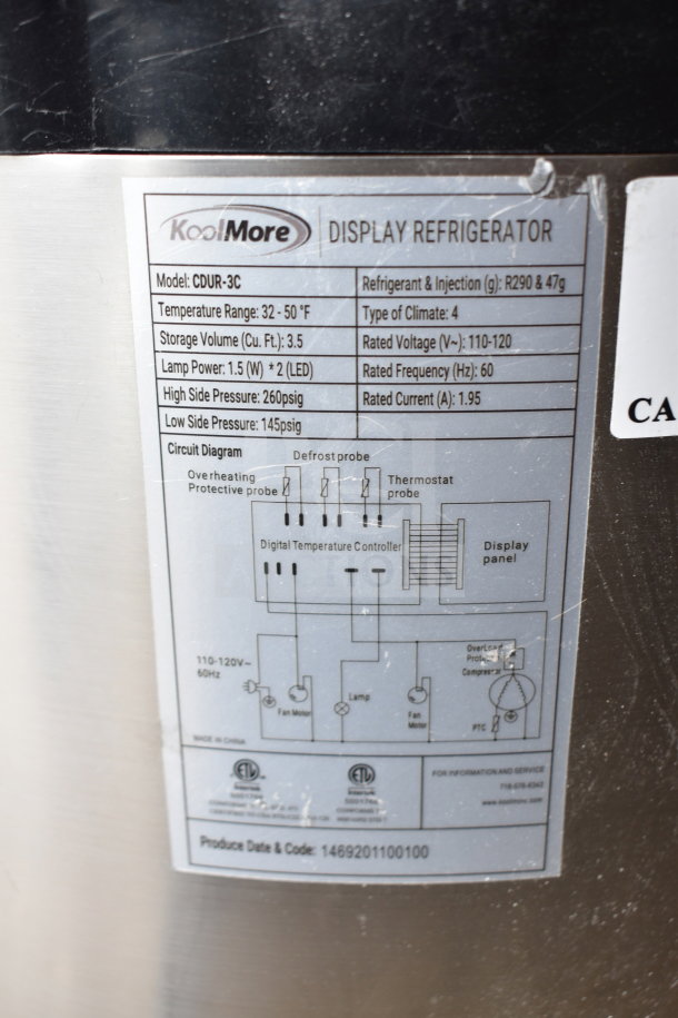 KoolMore CDUR-3C display case label showing specs: 32-50°F temp range, 3.5 cu. ft. volume, 110-120V, 60Hz, 1.95A.