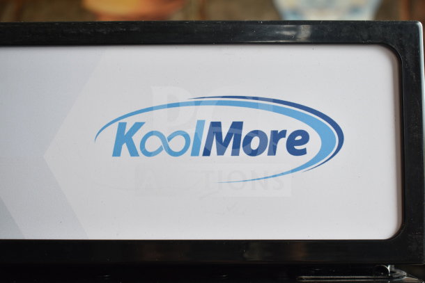 KoolMore logo on a commercial single door reach-in merchandiser tag, new with scratch and dent, 110-120 volts, 1 phase.